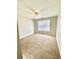 Cozy bedroom with neutral walls, carpet flooring, and a bright window view at 164 Haven Oak Way, Lawrenceville, GA 30044
