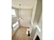 Open living space with tall ceilings and large windows offering abundant natural light at 164 Haven Oak Way, Lawrenceville, GA 30044