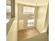 Bright living room featuring vaulted ceilings, hardwood floors, and an abundance of natural light at 164 Haven Oak Way, Lawrenceville, GA 30044