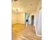 A well-lit living room with hard wood floors at 164 Haven Oak Way, Lawrenceville, GA 30044