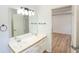 Bathroom with double sinks, a large mirror, and modern fixtures at 4032 Robin Cir, College Park, GA 30349