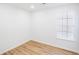 Bright bedroom with a window for natural light and modern flooring at 4032 Robin Cir, College Park, GA 30349