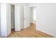 Bedroom with modern flooring, neutral walls, and closet at 4032 Robin Cir, College Park, GA 30349