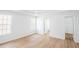 Bright, spacious bedroom features wood floors, a tray ceiling, and windows for ample natural light at 4032 Robin Cir, College Park, GA 30349
