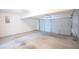 An empty single car garage with a rolling garage door, ready to park your car at 4032 Robin Cir, College Park, GA 30349