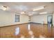 Spacious basement featuring unique wood flooring and ample lighting at 5000 Bainbridge Sw Ct, Lilburn, GA 30047