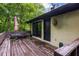 Back porch deck features a table and seating area, great for entertaining guests at 705 W Ponce De Leon Ave, Decatur, GA 30030