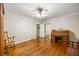 Bedroom features hardwood floors, a ceiling fan, and classic furnishings at 705 W Ponce De Leon Ave, Decatur, GA 30030
