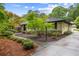 Charming home with a landscaped front yard featuring lush greenery and a stone pathway at 705 W Ponce De Leon Ave, Decatur, GA 30030
