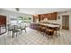 Spacious kitchen featuring a large island, stainless steel appliances, and a breakfast nook at 705 W Ponce De Leon Ave, Decatur, GA 30030
