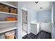 Inside the pool house shows open shelving and sink with powder blue walls at 705 W Ponce De Leon Ave, Decatur, GA 30030