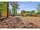 Private backyard featuring a shed and grassy area perfect for outdoor entertaining and relaxation at 1079 Pinedale Se Dr, Smyrna, GA 30080