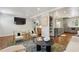 Open-concept living room featuring modern decor, hardwood floors, and seamless flow to the kitchen at 1079 Pinedale Se Dr, Smyrna, GA 30080
