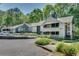 Attractive condo complex with manicured landscaping and ample parking spaces at 1426 N Crossing Ne Dr, Atlanta, GA 30329