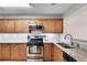 Updated kitchen showcases stainless steel appliances and granite countertops at 1426 N Crossing Ne Dr, Atlanta, GA 30329