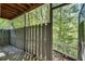Enclosed patio space with mature trees creating a private and peaceful outdoor experience at 1426 N Crossing Ne Dr, Atlanta, GA 30329