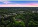Expansive aerial view showing the property nestled among mature trees in a peaceful, established neighborhood at 1540 Brooks S Rd, Lawrenceville, GA 30045