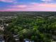 Extensive aerial shot showcases the property within a lush, green, mature neighborhood at 1540 Brooks S Rd, Lawrenceville, GA 30045