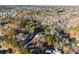 Overhead view of a modern home nestled among trees on a long lot in a mature neighborhood at 1540 Brooks S Rd, Lawrenceville, GA 30045