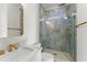 A modern bathroom featuring green marble and elegant gold fixtures at 1540 Brooks S Rd, Lawrenceville, GA 30045