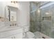 A modern bathroom featuring green marble and elegant gold fixtures at 1540 Brooks S Rd, Lawrenceville, GA 30045