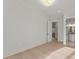 Bright, minimalist bedroom adjacent to ensuite bathroom at 1540 Brooks S Rd, Lawrenceville, GA 30045