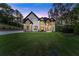 Beautiful two-story home with manicured lawn and modern design at 1540 Brooks S Rd, Lawrenceville, GA 30045