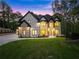Beautiful two-story home with lush lawn and meticulous landscaping at 1540 Brooks S Rd, Lawrenceville, GA 30045
