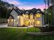 Well-manicured lawn enhances this stunning two-story home at 1540 Brooks S Rd, Lawrenceville, GA 30045