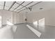 Clean garage with shelving and ample space for parking at 1540 Brooks S Rd, Lawrenceville, GA 30045