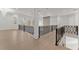 Open hallway with modern railings and lots of natural light from the windows at 1540 Brooks S Rd, Lawrenceville, GA 30045