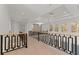 Bright hallway with hardwood floors, modern railings, and large windows allowing for ample natural light at 1540 Brooks S Rd, Lawrenceville, GA 30045