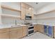 This kitchen features ample counter space, modern appliances, and light wood cabinets for a cozy and inviting atmosphere at 1540 Brooks S Rd, Lawrenceville, GA 30045