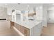 Gourmet kitchen with oversized island, custom cabinets, and stainless appliances at 1540 Brooks S Rd, Lawrenceville, GA 30045