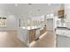 Modern kitchen with island, stainless steel appliances, and hardwood floors at 1540 Brooks S Rd, Lawrenceville, GA 30045