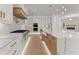 Bright, modern kitchen with granite countertops, stainless steel appliances, and custom cabinets at 1540 Brooks S Rd, Lawrenceville, GA 30045
