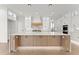 Modern kitchen with custom cabinets, island, and stainless steel appliances at 1540 Brooks S Rd, Lawrenceville, GA 30045