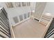 Open living room with soaring ceilings, a fireplace, hardwood floors, and large windows for abundant natural light at 1540 Brooks S Rd, Lawrenceville, GA 30045