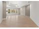 Bright living room featuring hardwood floors, recessed lights, and multiple windows overlooking outdoor scenery at 1540 Brooks S Rd, Lawrenceville, GA 30045