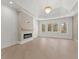 Living room featuring an electric fireplace with light wood mantel at 1540 Brooks S Rd, Lawrenceville, GA 30045