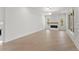 Bright Living Room with a fireplace, large windows with natural light, and hardwood floors at 1540 Brooks S Rd, Lawrenceville, GA 30045