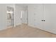 Main bedroom with ensuite bathroom and hallway access at 1540 Brooks S Rd, Lawrenceville, GA 30045