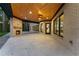 Covered patio featuring recessed lighting, a wood ceiling, and a stone fireplace at 1540 Brooks S Rd, Lawrenceville, GA 30045