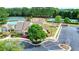 Aerial shot of community clubhouse, pool, tennis courts, playground, and parking area at 1993 Side Branch Way, Lawrenceville, GA 30045