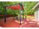 Inviting backyard deck with pergola, seating, and a peaceful setting at 605 Sutton Sw Way, Marietta, GA 30064