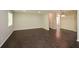 Open living room with hardwood floors and lots of space to relax and entertain at 605 Sutton Sw Way, Marietta, GA 30064