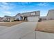 Alluring one-story house with a concrete driveway leading to a two-car garage at 242 Cordova St, Woodstock, GA 30189