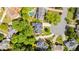 Aerial view of a home surrounded by lush greenery in a residential neighborhood at 3105 Birchton St, Johns Creek, GA 30022