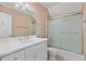Cozy bathroom with shower/tub combo, and a white vanity with plenty of storage at 3105 Birchton St, Johns Creek, GA 30022