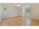 Bright bedroom with hardwood floors and a unique round window at 3105 Birchton St, Johns Creek, GA 30022